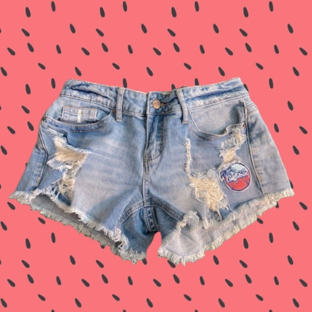 Rue 21 mid rise shortie jean shorts. Size 0